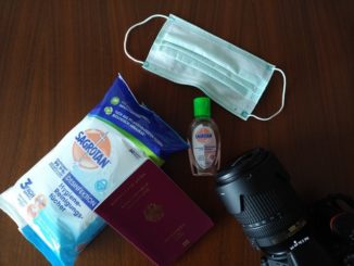 Mundschutz, Desinfektionsmittel und Kamera - Reisen zu Zeiten des Coronavirus im Februar 2020
